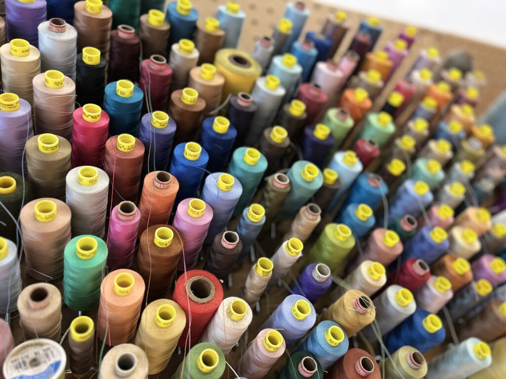 Colorful Guttermann polyester thread spools for sewing